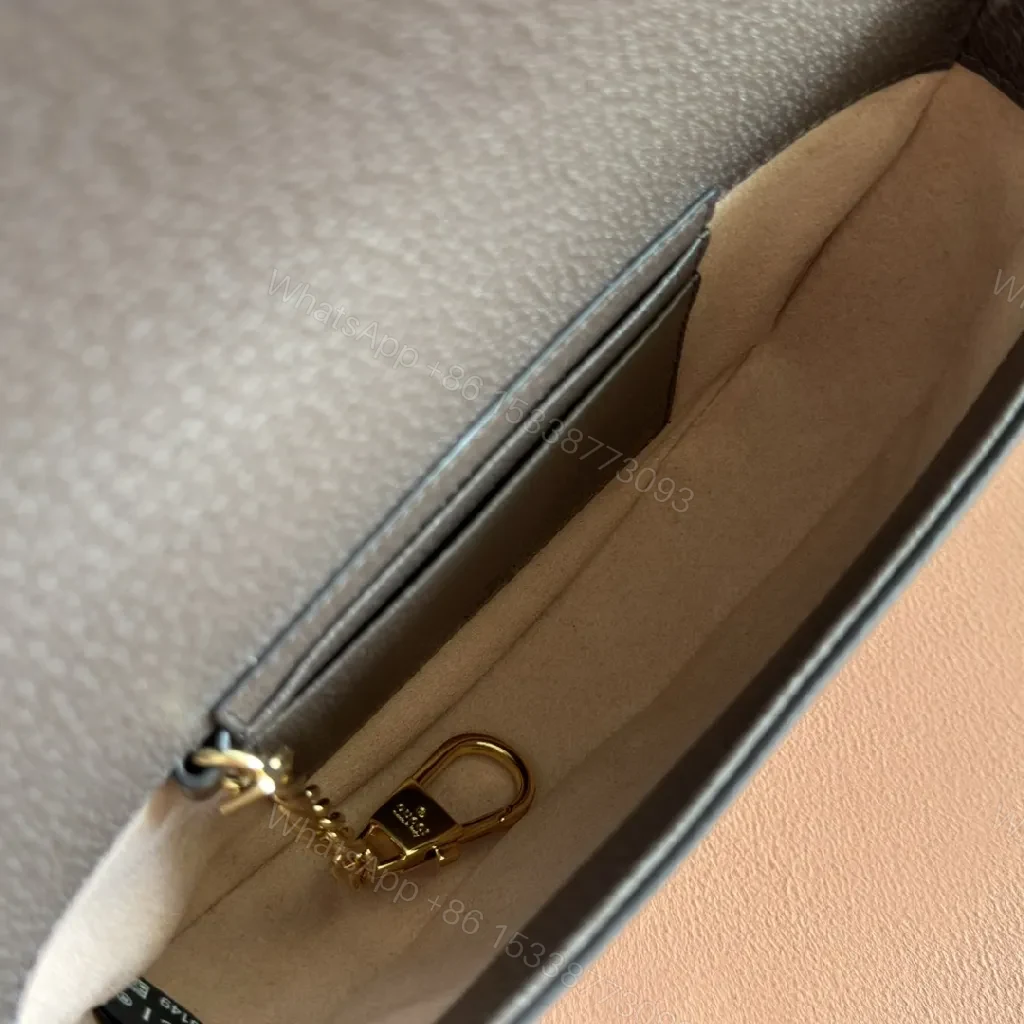 View 3 of Green Canvas Saddle Bag: Luxe Crossbody with Web Stripe and Gold Hardware