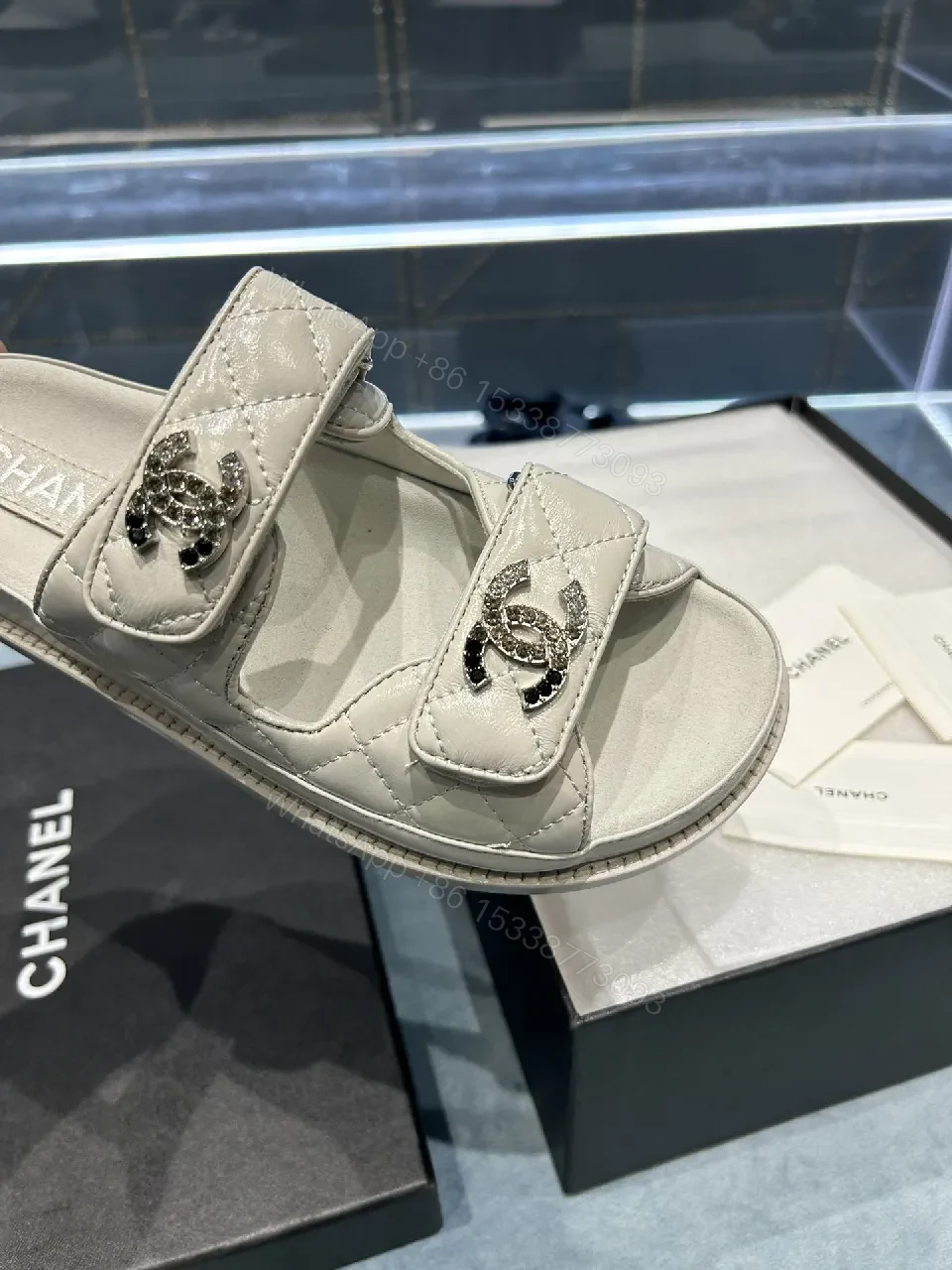 View 6 of Chic White Sandals with Quilted Straps and Logo Hardware