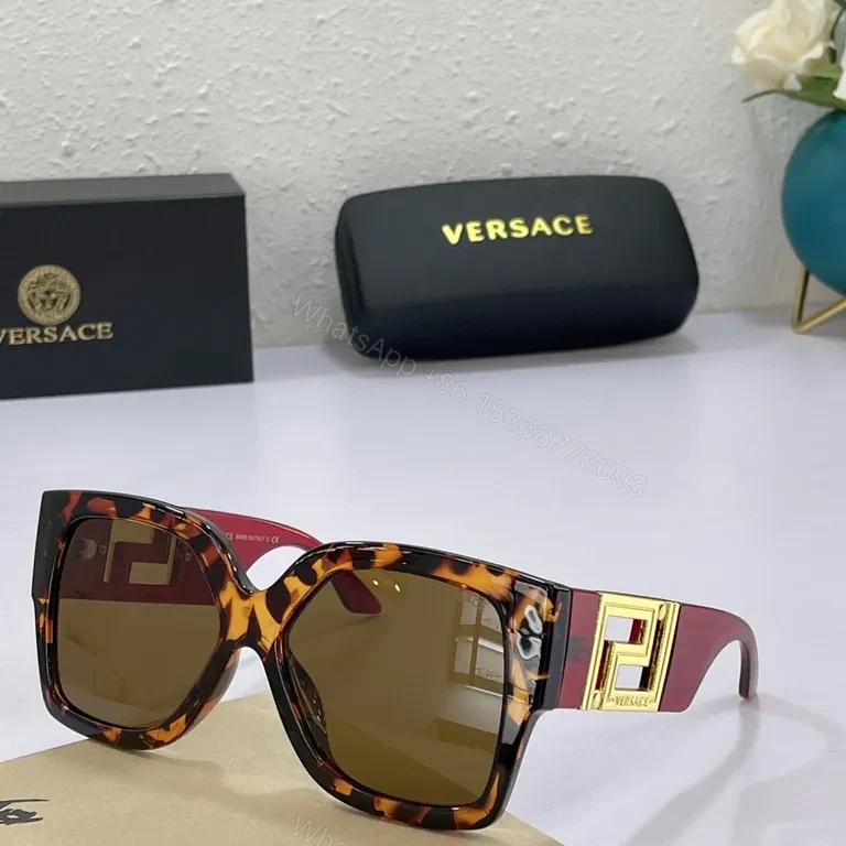 View 2 of Bold Black Acetate Sunglasses: Versace, Oversized Square with Gold Accents