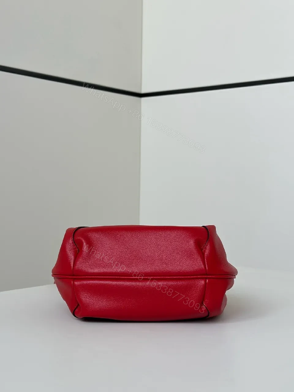 View 8 of Red Leather Knotted Mini Bag, Structured, Crossbody Ready