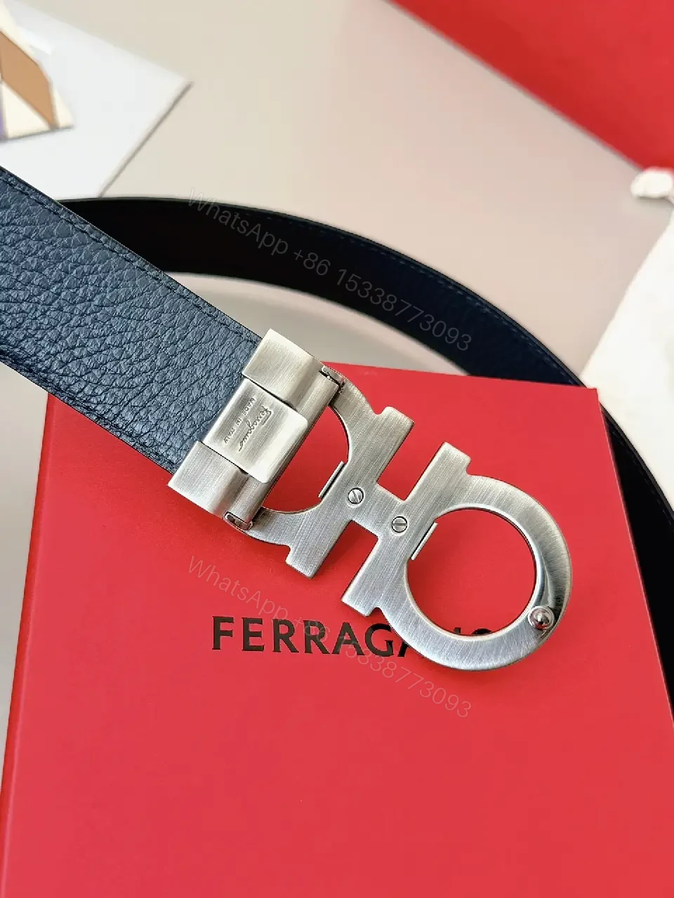 View 4 of Silk-Soft Leather Belt with Signature Buckle – Modern Texture