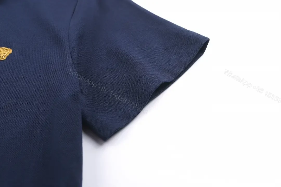 View 5 of Minimalist Navy Knit Polo: Subtle Crest Luxury Polo
