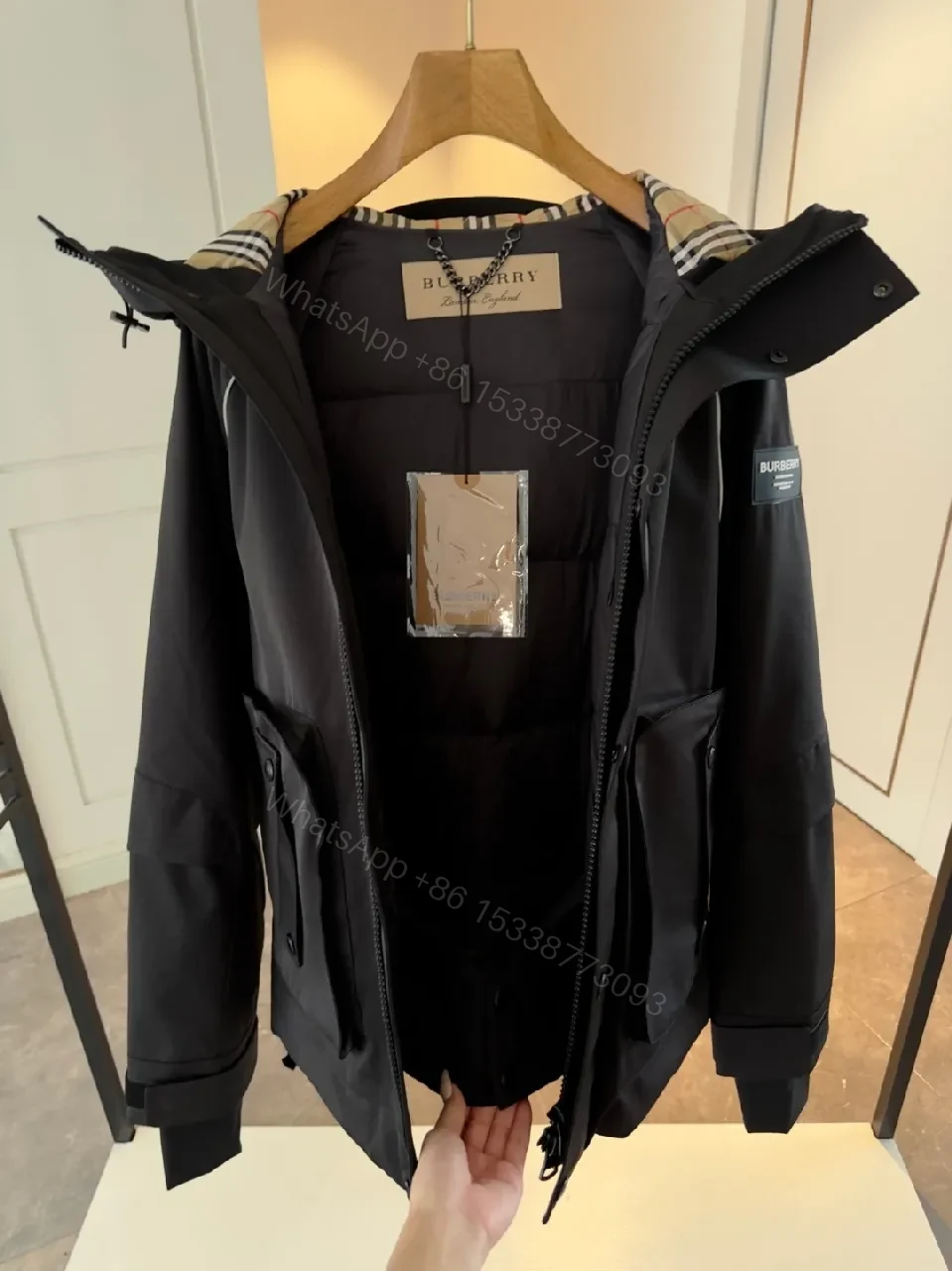 View 9 of Water-Resistant Black Parka with Plaid Lining Luxury-Utility Coat