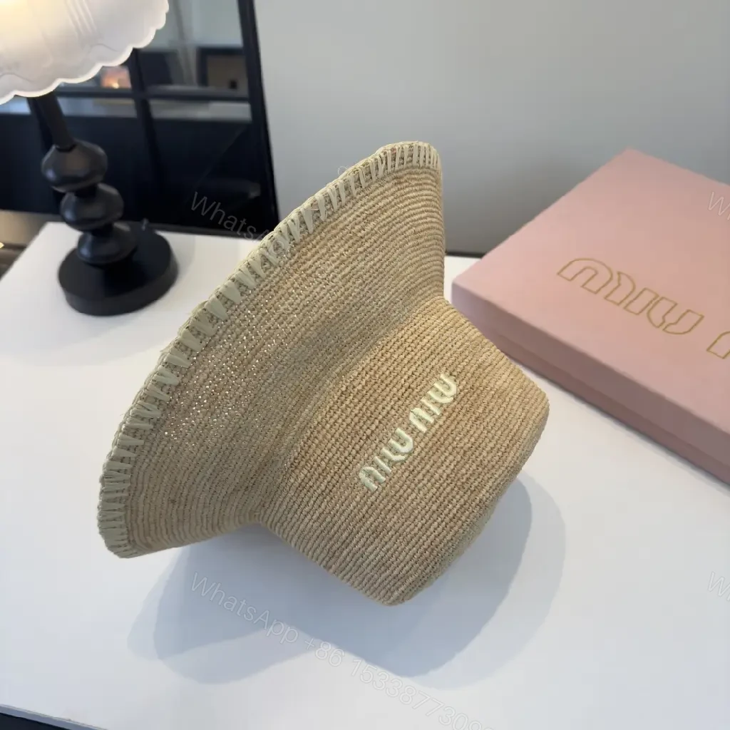 View 3 of Natural Straw Bucket Hat with Subtle Logo Detail