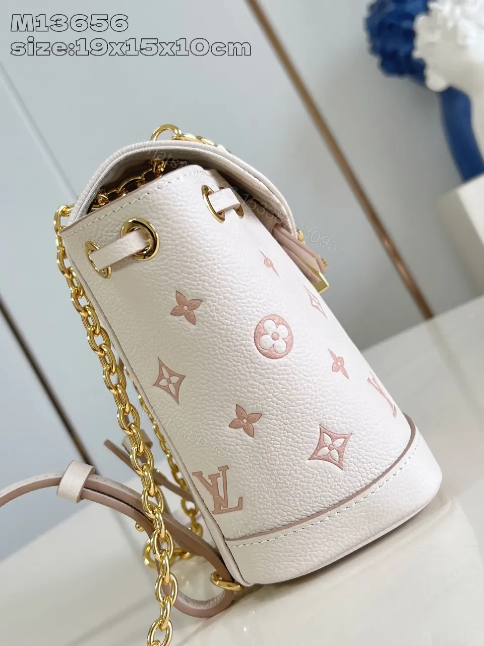 View 4 of Soft Pink Monogram Bucket Bag - Textured Leather, Gold Hardware, Elegant