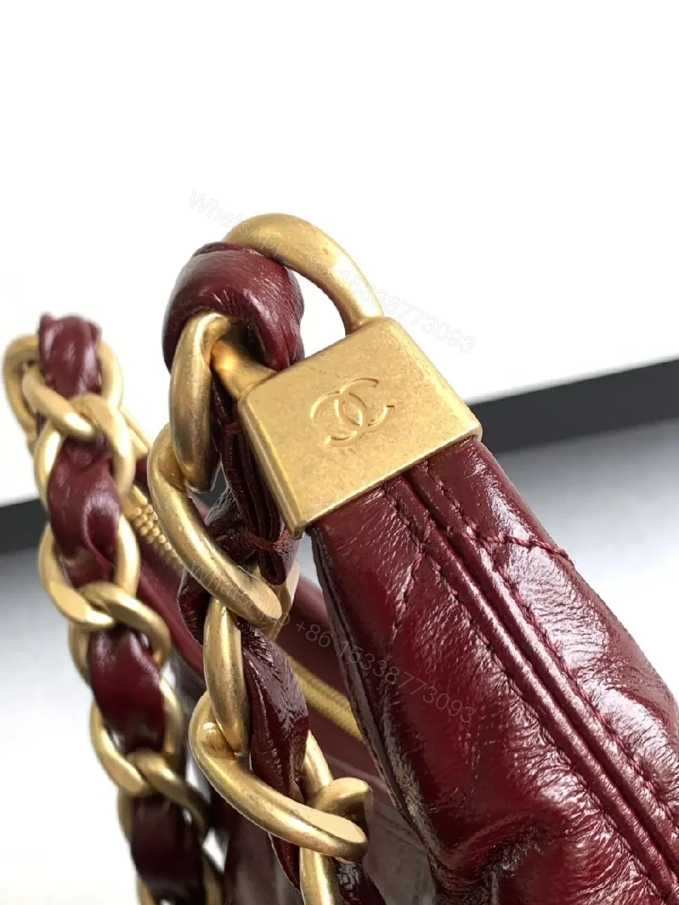 View 8 of Burgundy Quilted Mini Bag with Gold Chain Strap