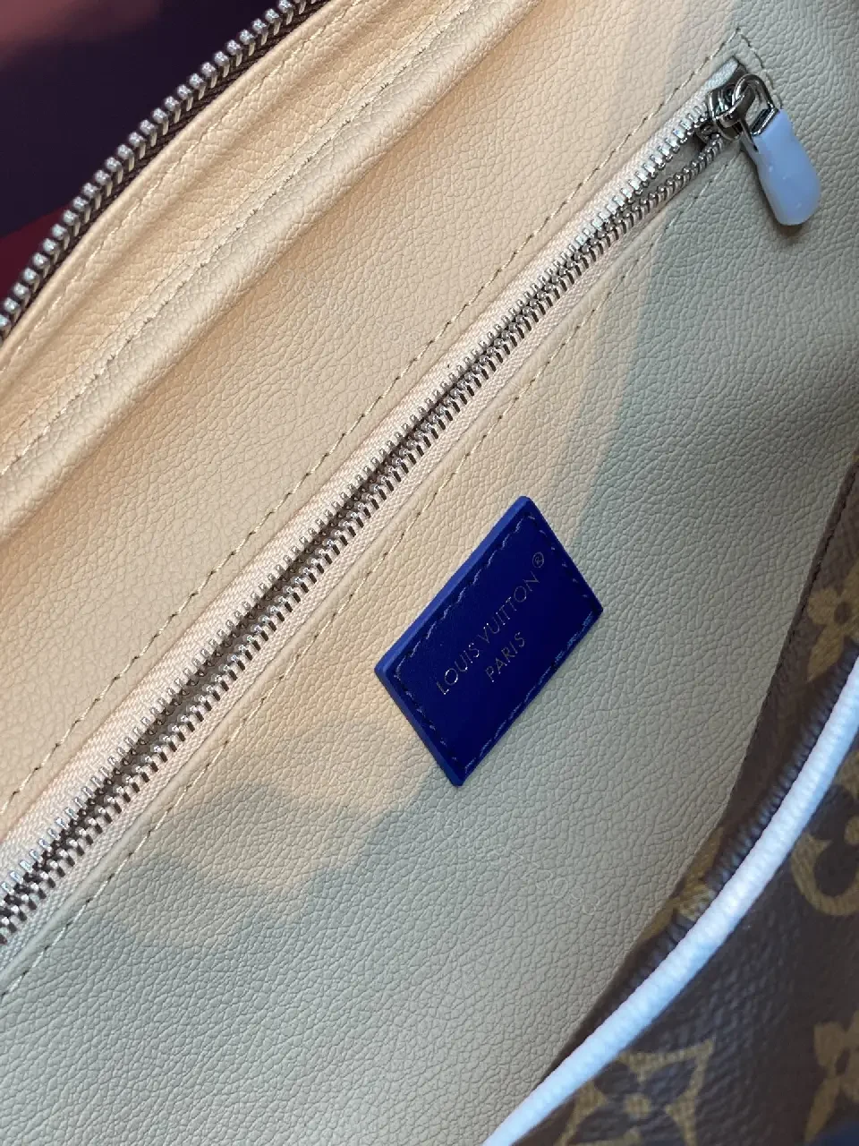 View 2 of Blue Leather Trim Toiletry Bag: Monogram Canvas, LV Zippers, Adjustable Strap