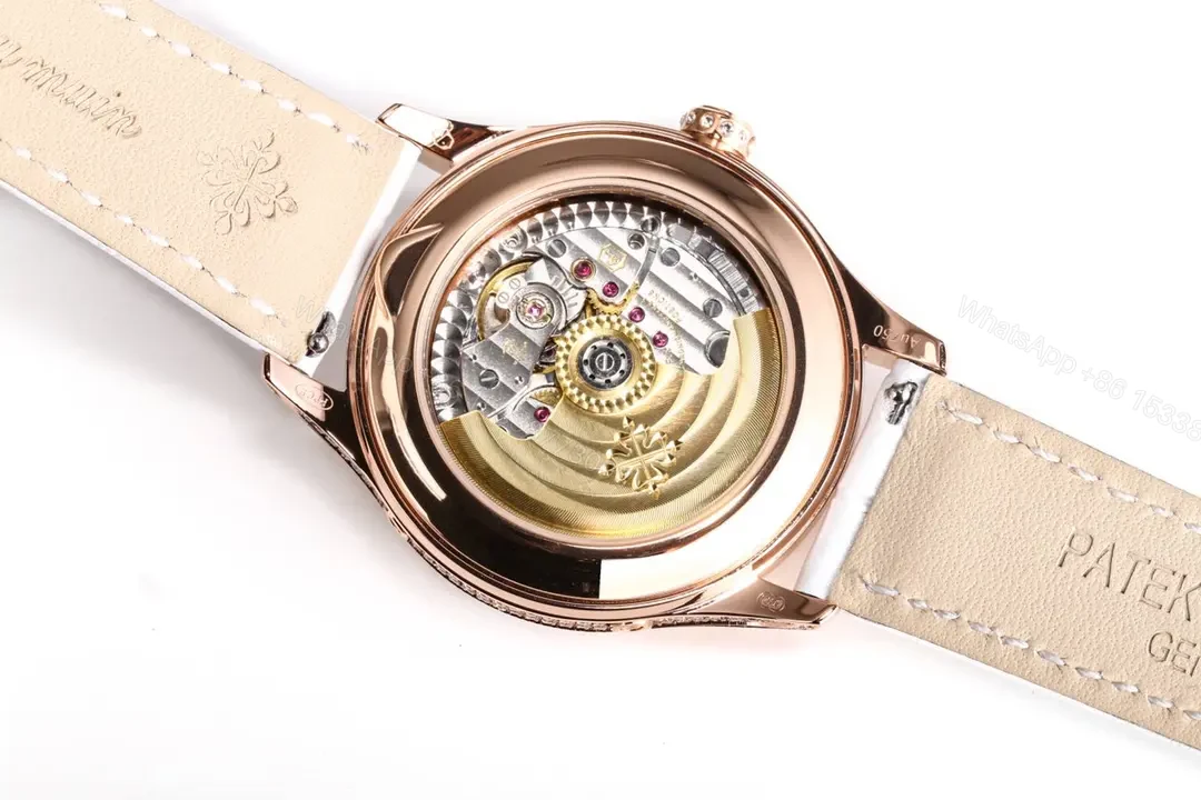View 7 of Patek Philippe Complications Collection Ladies’ Annual Calendar Moon Phase Watch in Rose Gold with Diamond Set Case White Mother of Pearl Dial and Italian Leather Strap