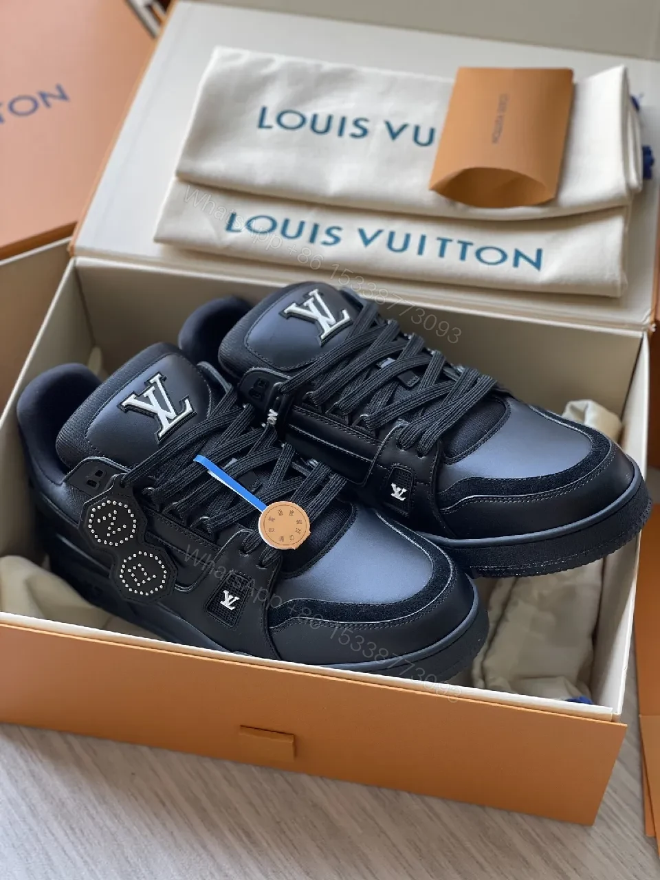 View 7 of Black Leather High‐Top Sneakers with LV Embellishments