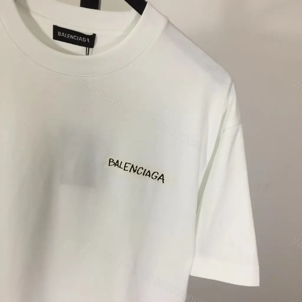 View 2 of Minimalist White Tee with Luxe Subtle Logo – Modern Essential T-Shirt
