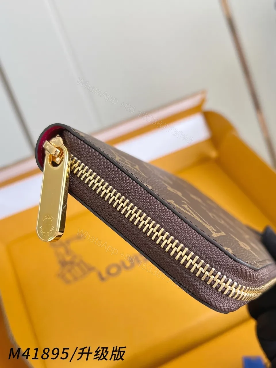View 6 of Compact Monogram Leather Wallet: Signature Texture, Gold Zipper