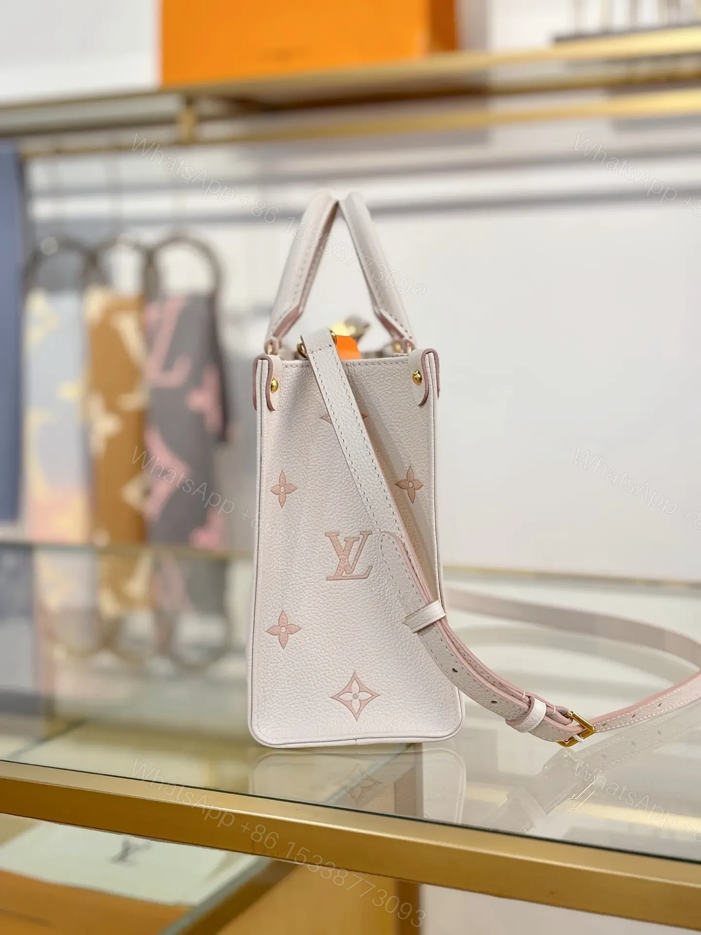 View 4 of Louis Vuitton OnTheGo Mini bag (M14403) in white Monogram Empreinte