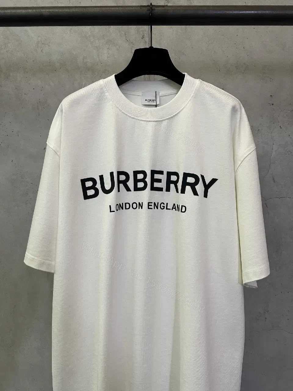 View 9 of Bold Logo Tee: Minimalist Comfort, Black Graphic White Tee