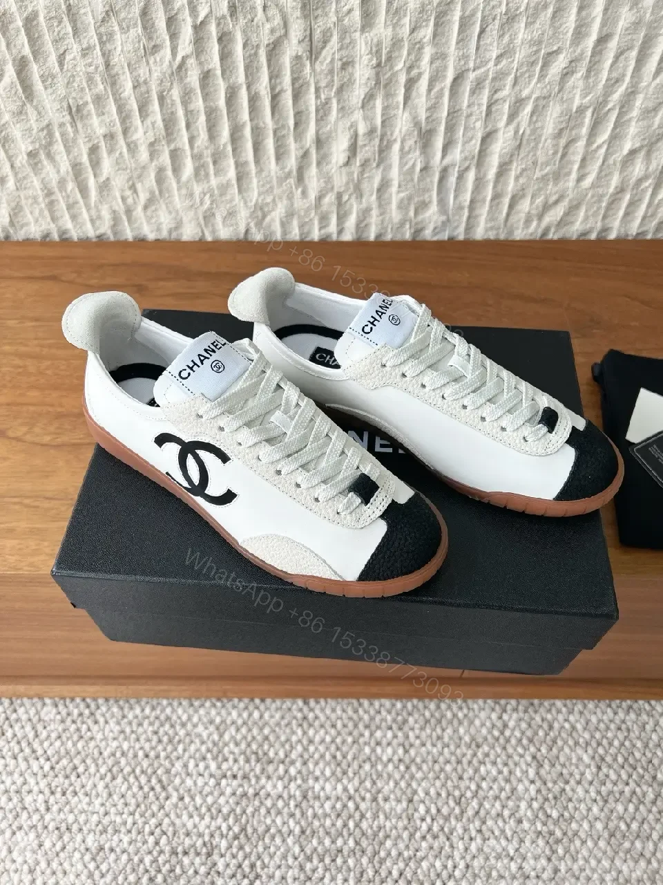 View 6 of Chic Monochrome Leather-Accent Luxury Sneaker, Low-Top