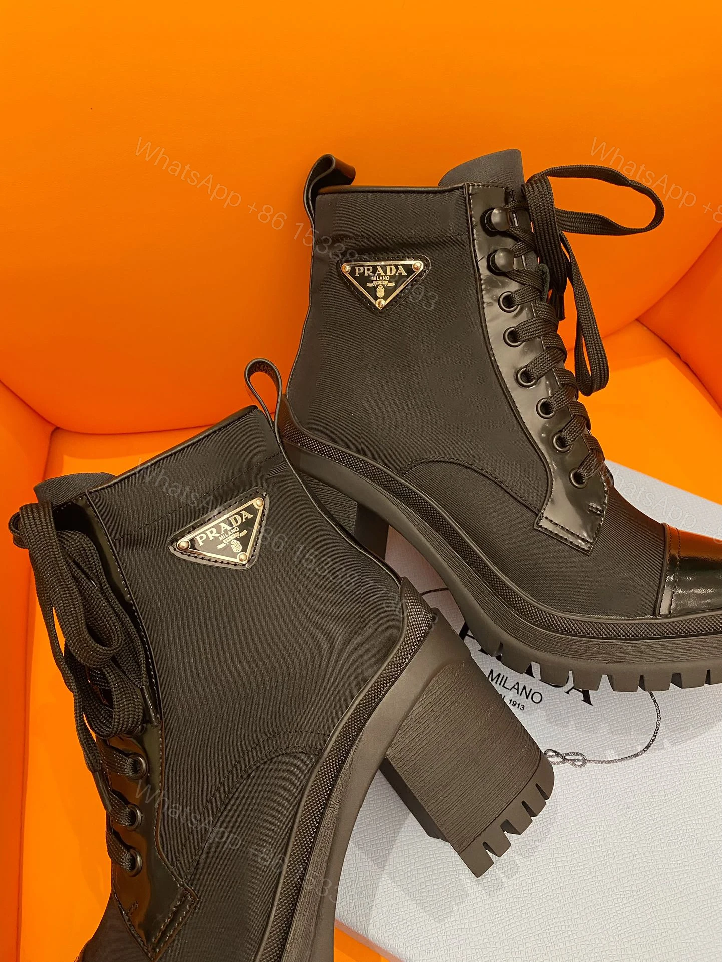 View 2 of PRADA LOGO PLAQUE ANKLE BOOTS BLACK