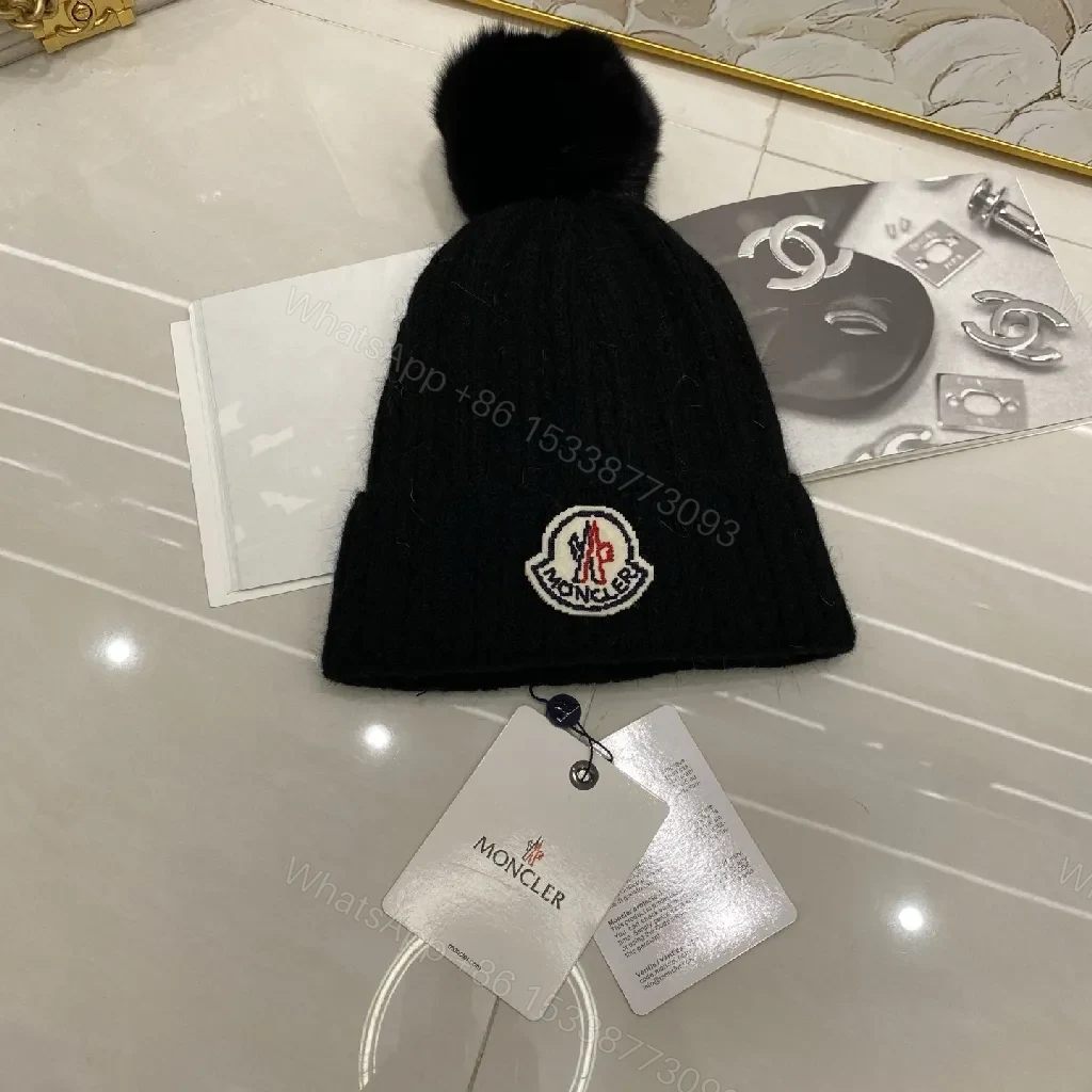 View 2 of Neutral Knit Beanie with Plush Pom and Luxe Patch