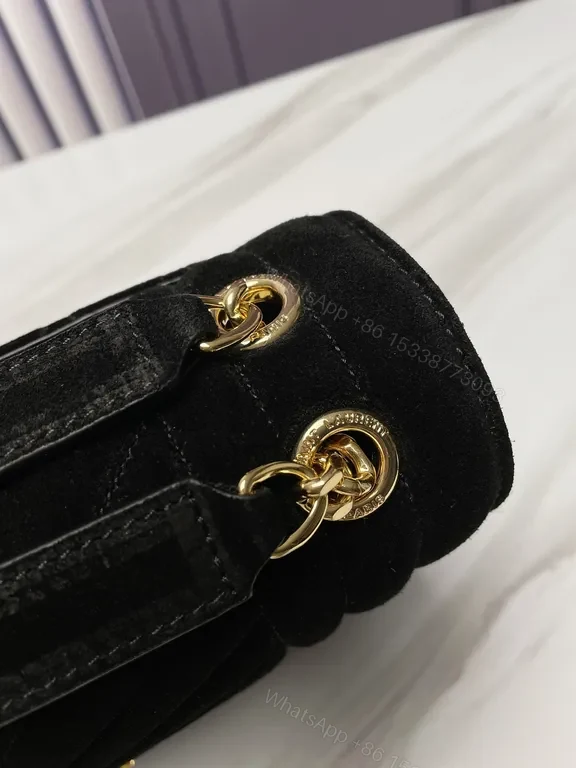 View 2 of Quilted Calfskin Bag with Gold YSL Emblem: Compact Luxury