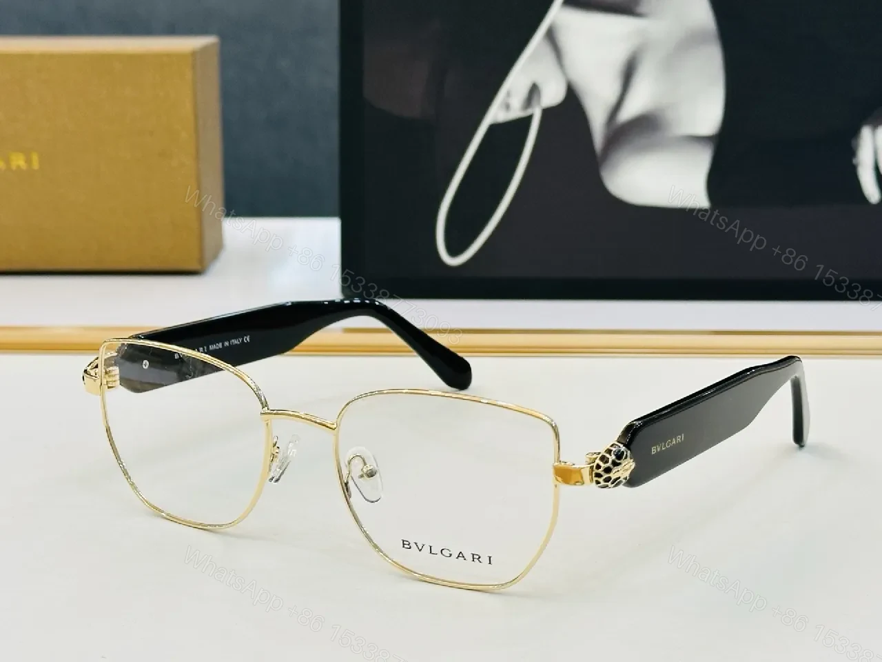 Gold-Frame Round Glasses with Black Temple Accents, Luxe Style — view 1