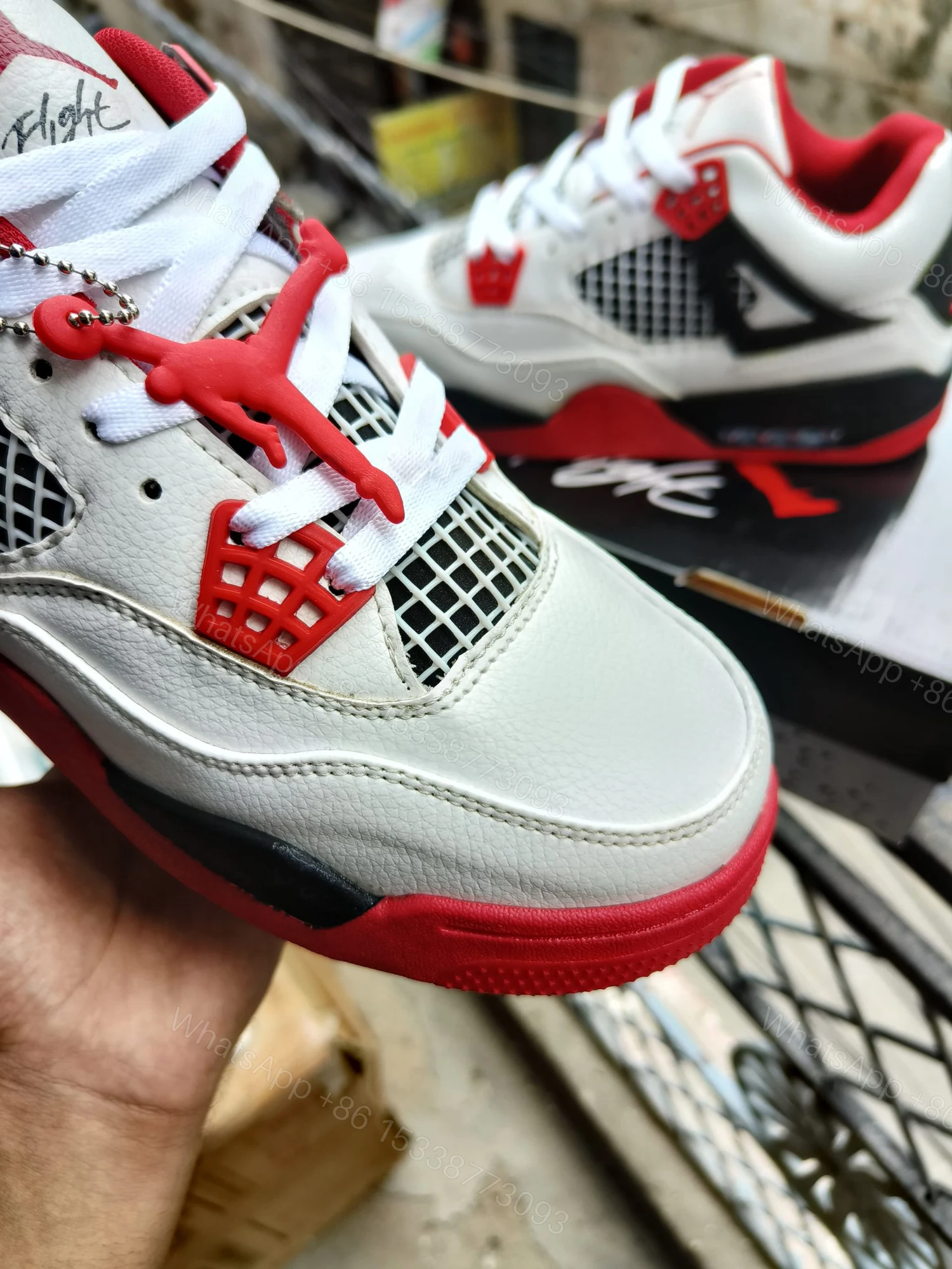 View 10 of BUY FIRST COPY NIKE JORDAN 4 “RED/WHITE” SNEAKERS