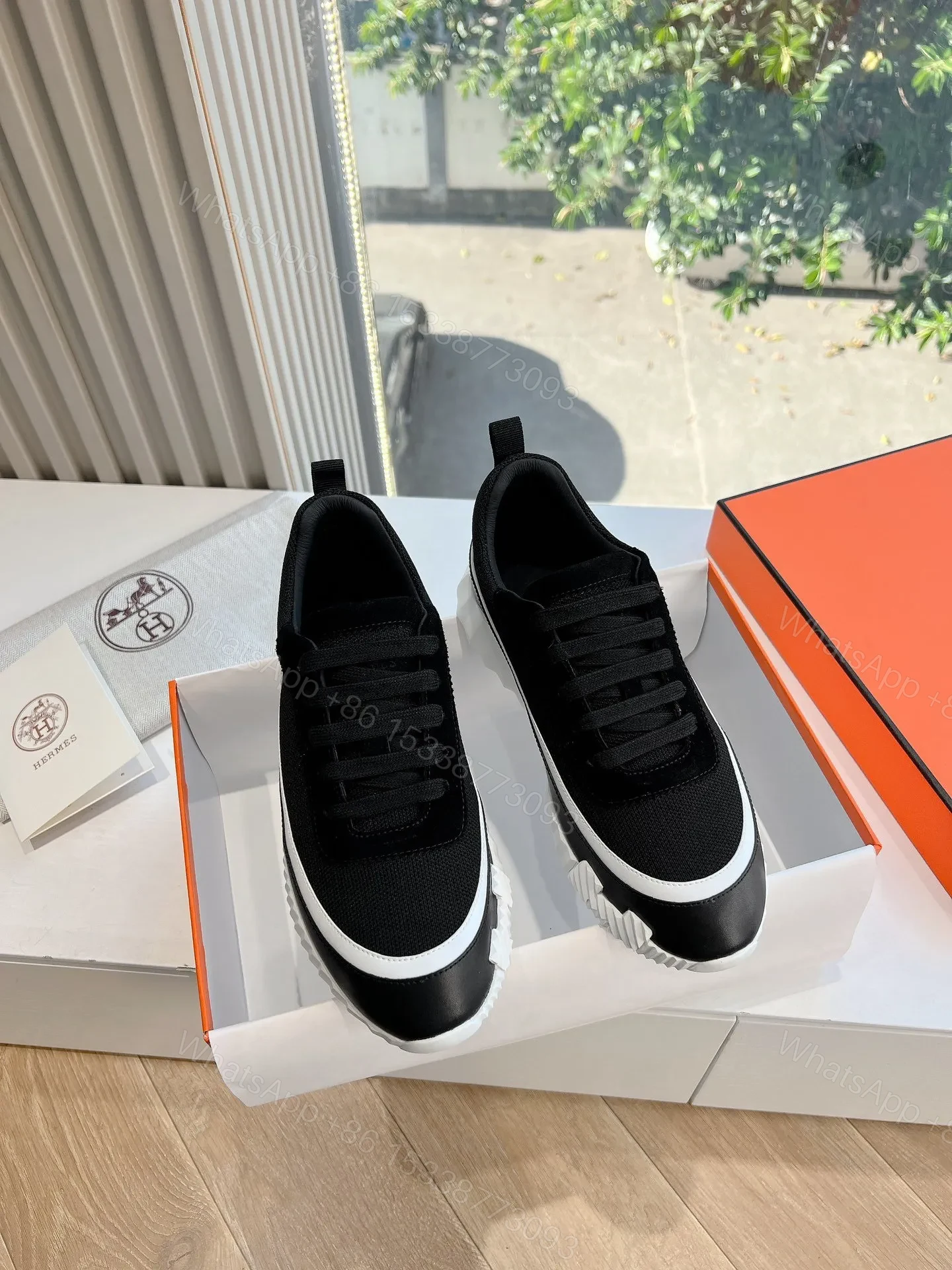 View 3 of Hermes Women Black Mesh And Leather Sneakers