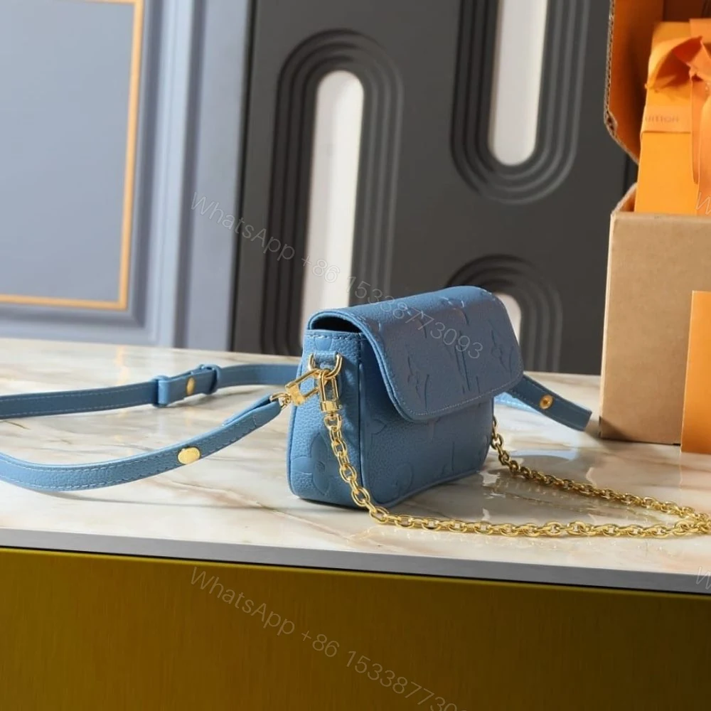 View 3 of Louis Vuitton Wallet On Chain Ivy Monogram Empreinte Blue Jean 23Cm M27755