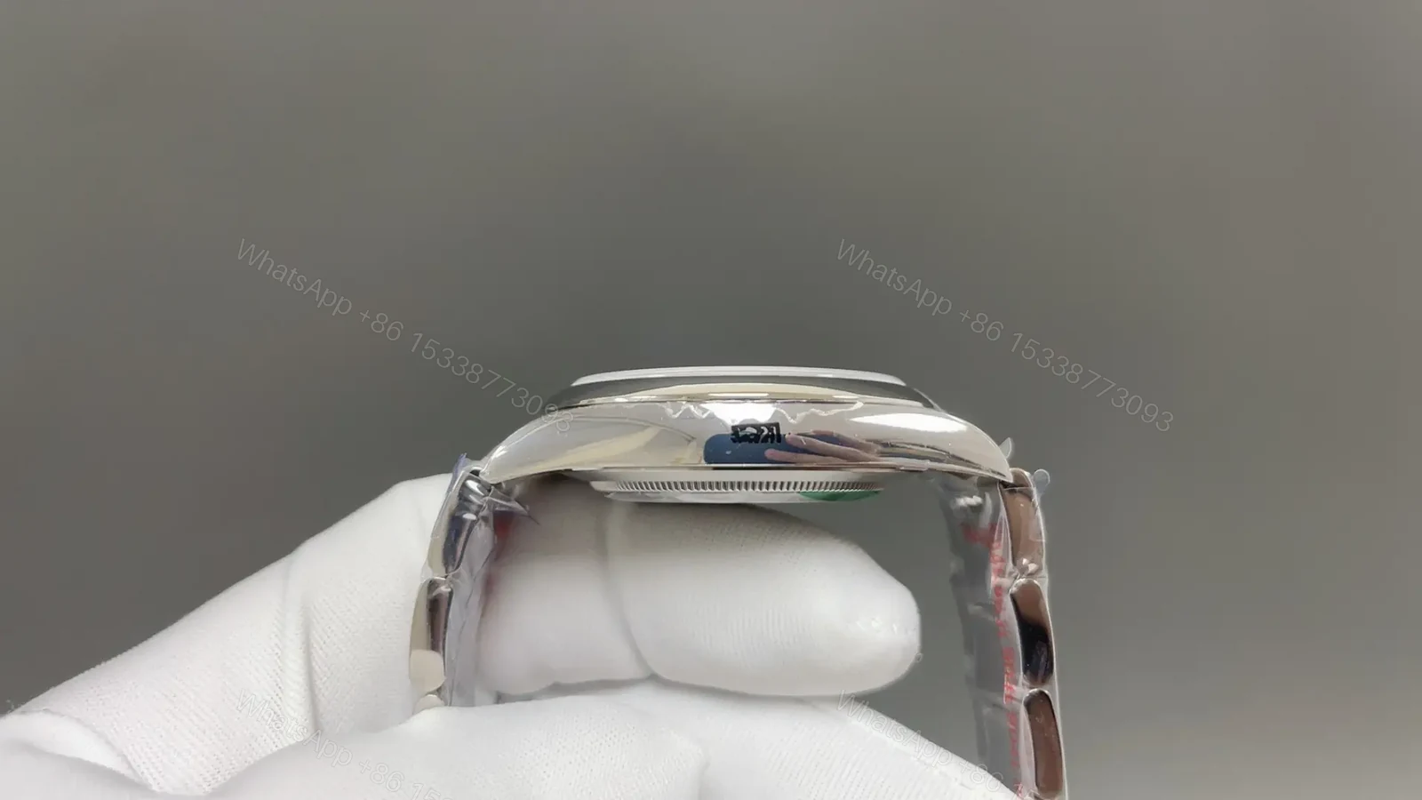 View 5 of Rolex Oyster Perpetual 41 124300 Red Dial Watch 124300-0007