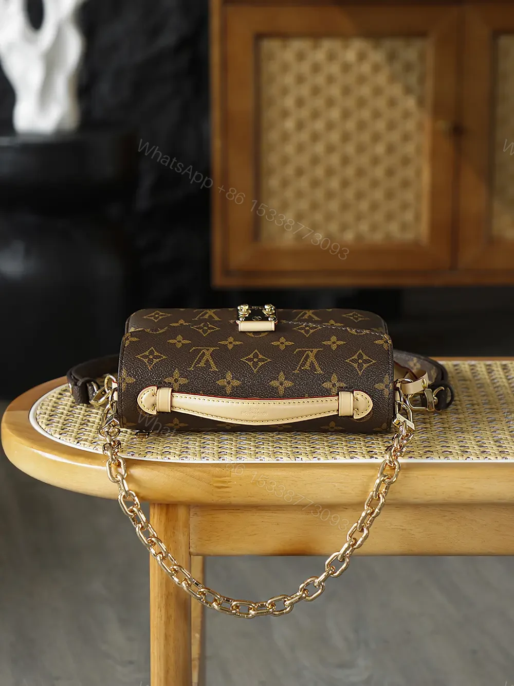 View 6 of Louis Vuitton Pochette Métis East West bag
