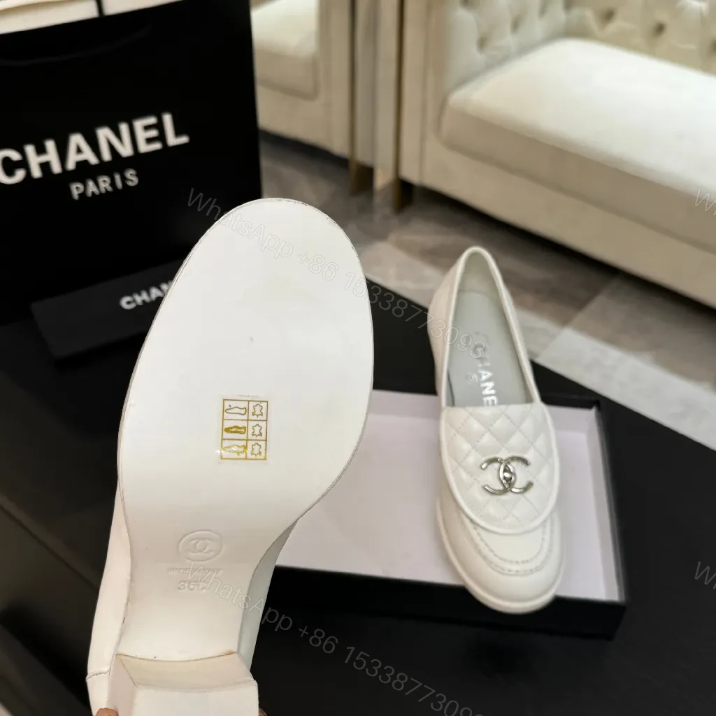 View 8 of Cream Leather Quilted Loafers with Signature Detail - Slip-On Style
