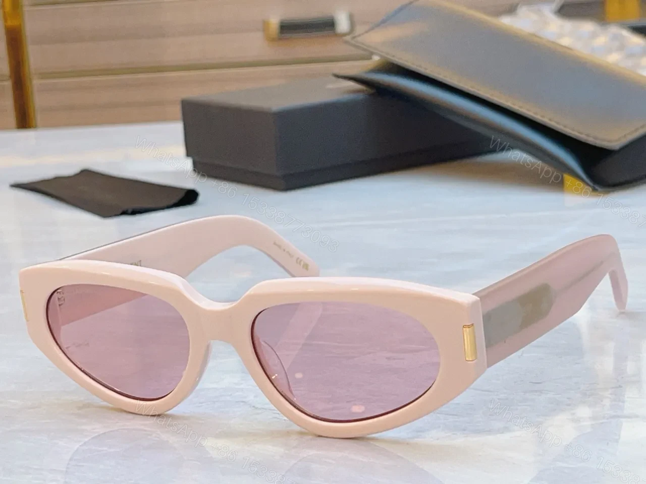 View 9 of Tortoiseshell Cat-Eye Sunglasses with Gold Hardware, UV400 Lens