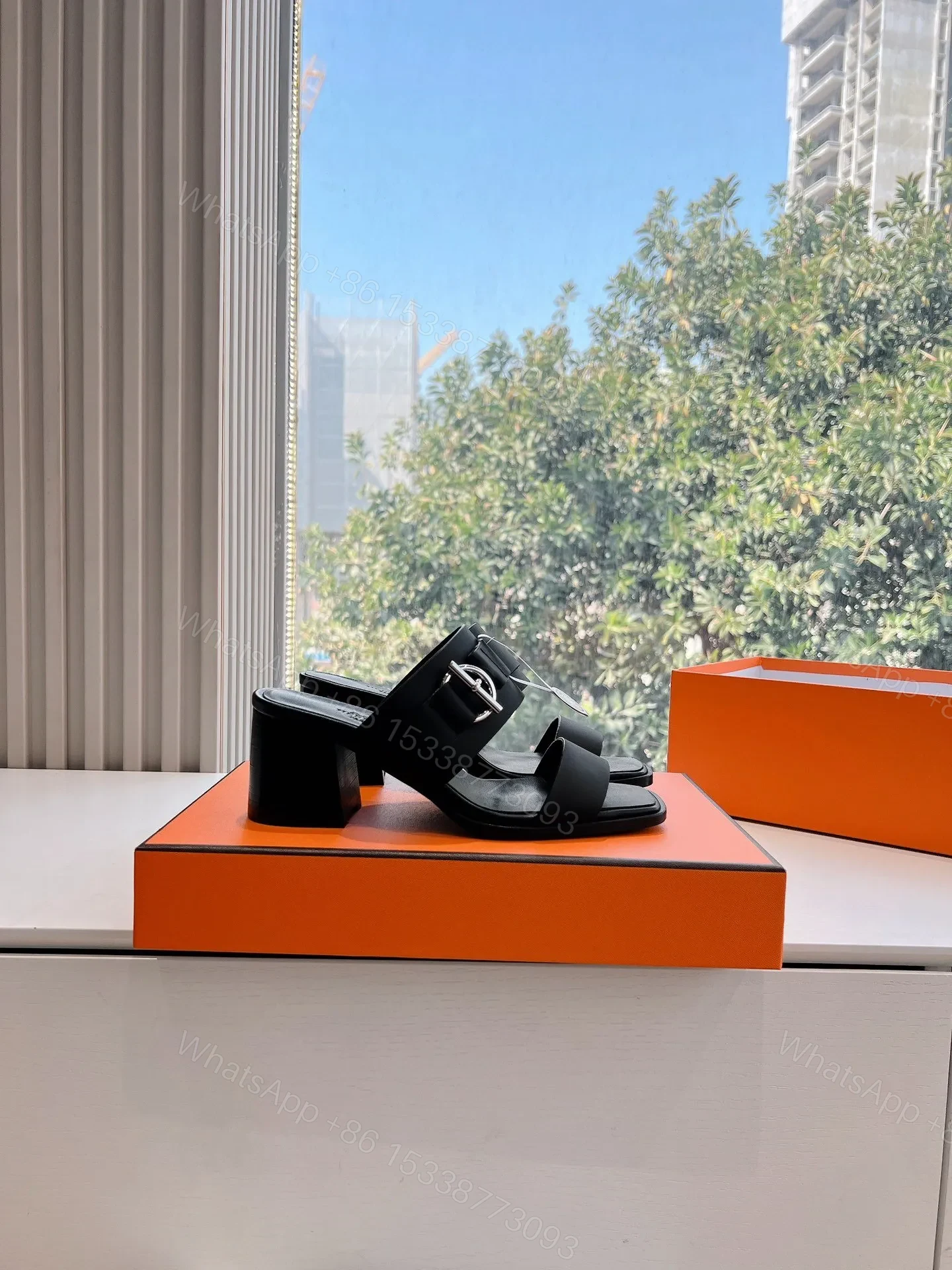 View 2 of Hermes Women Black Leather Buckle Mules