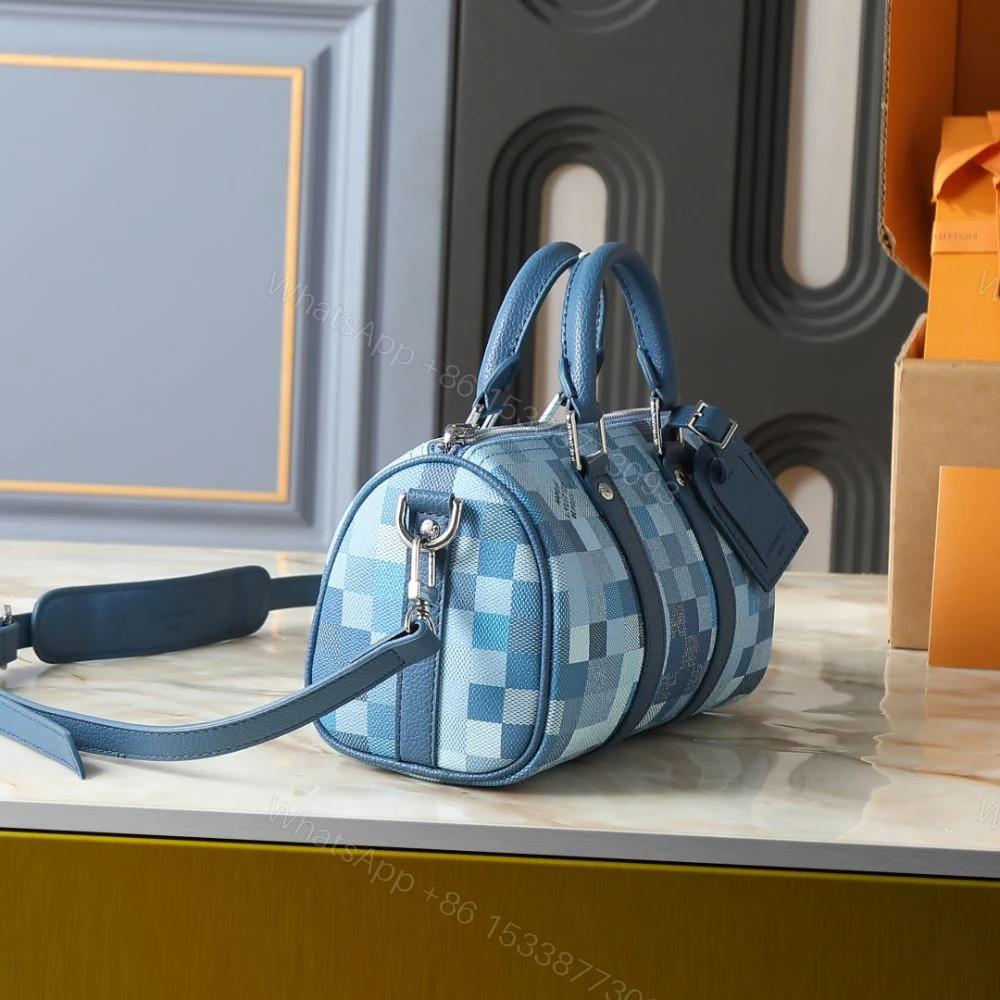 View 3 of Louis Vuitton Keepall Bandoulière 25 Blue 25Cm M28600