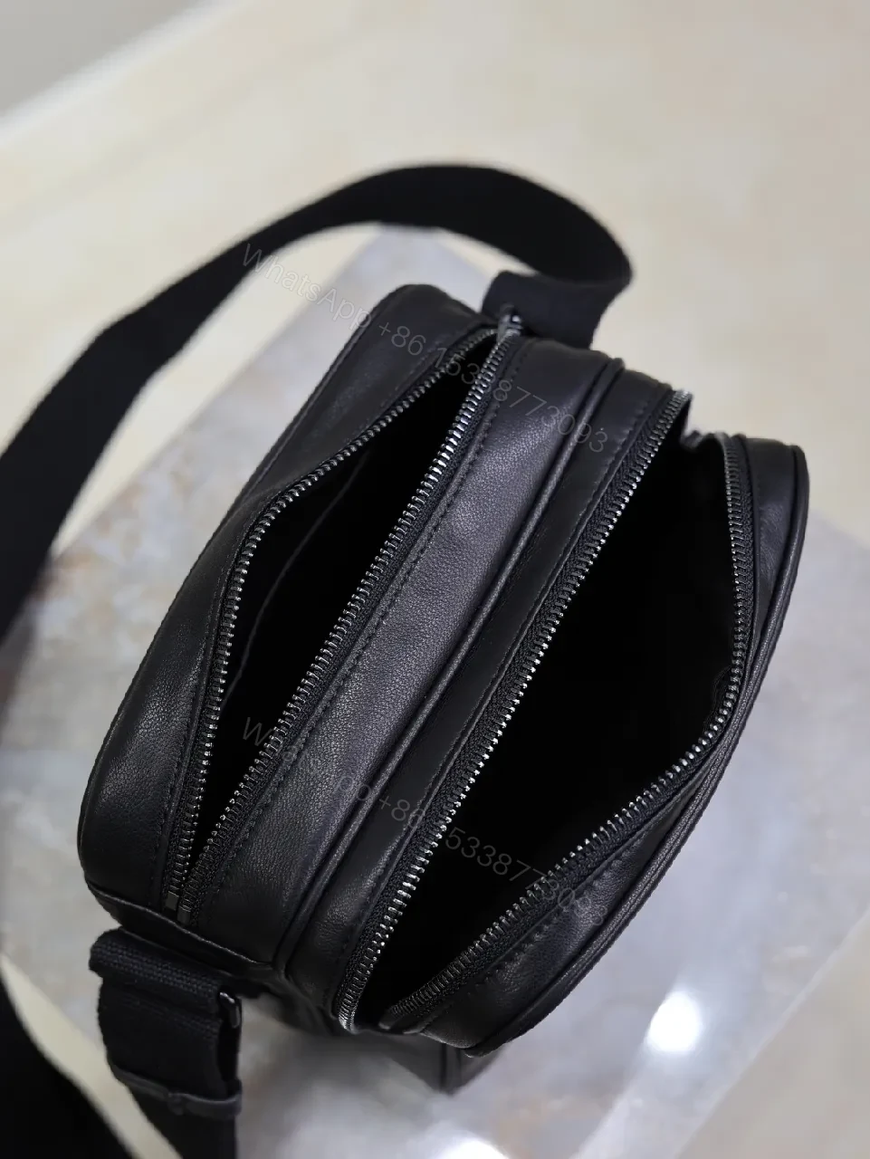 View 6 of Compact Black Leather Crossbody – Sleek, Everyday Luxury Bag