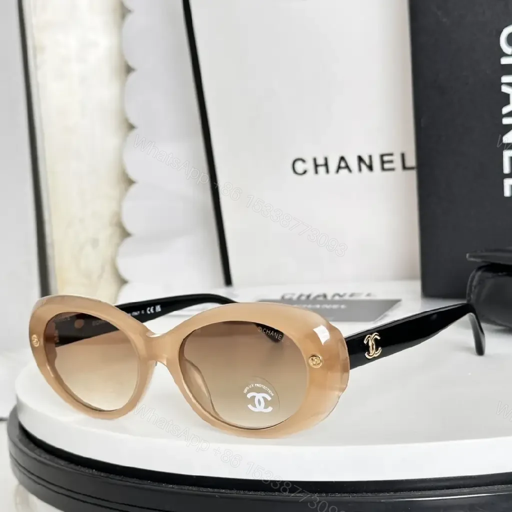 View 2 of Lux Black Round Sunglasses with Gold Hardware, Oversized UV Protection