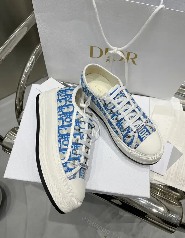 View 2 of Blue Canvas Sneakers with Dior Monogram Logo - Modern Luxe Footwear