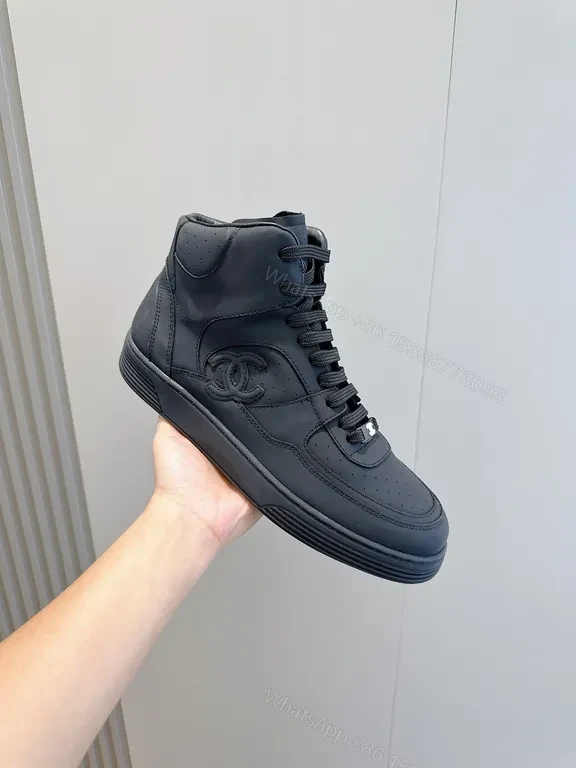 Chic Black Leather High-Top Sneakers with Luxury Detailing — view 1