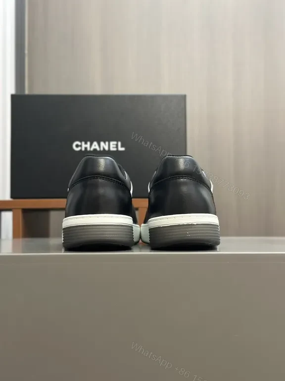 View 6 of Monochrome Chanel-Style Low-Top Sneakers with Signature Emblem