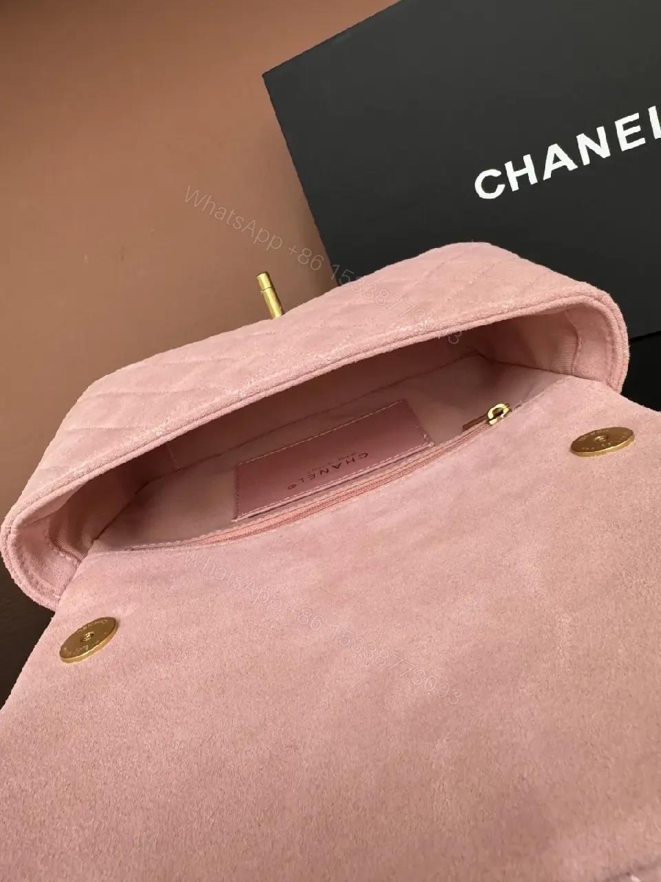 View 2 of Soft Pink Quilted Shoulder Bag with Gold Lock - Compact Luxury Bag