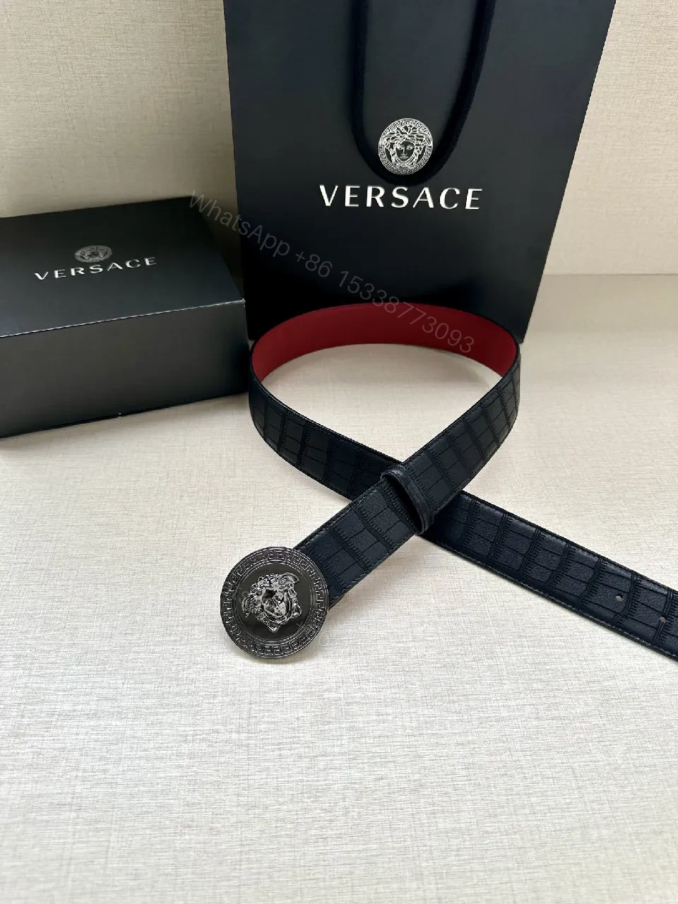 View 5 of Textured Leather Belt with Medusa Buckle - Crocodile-Embossed, Black/Burgundy, Luxury Belt
