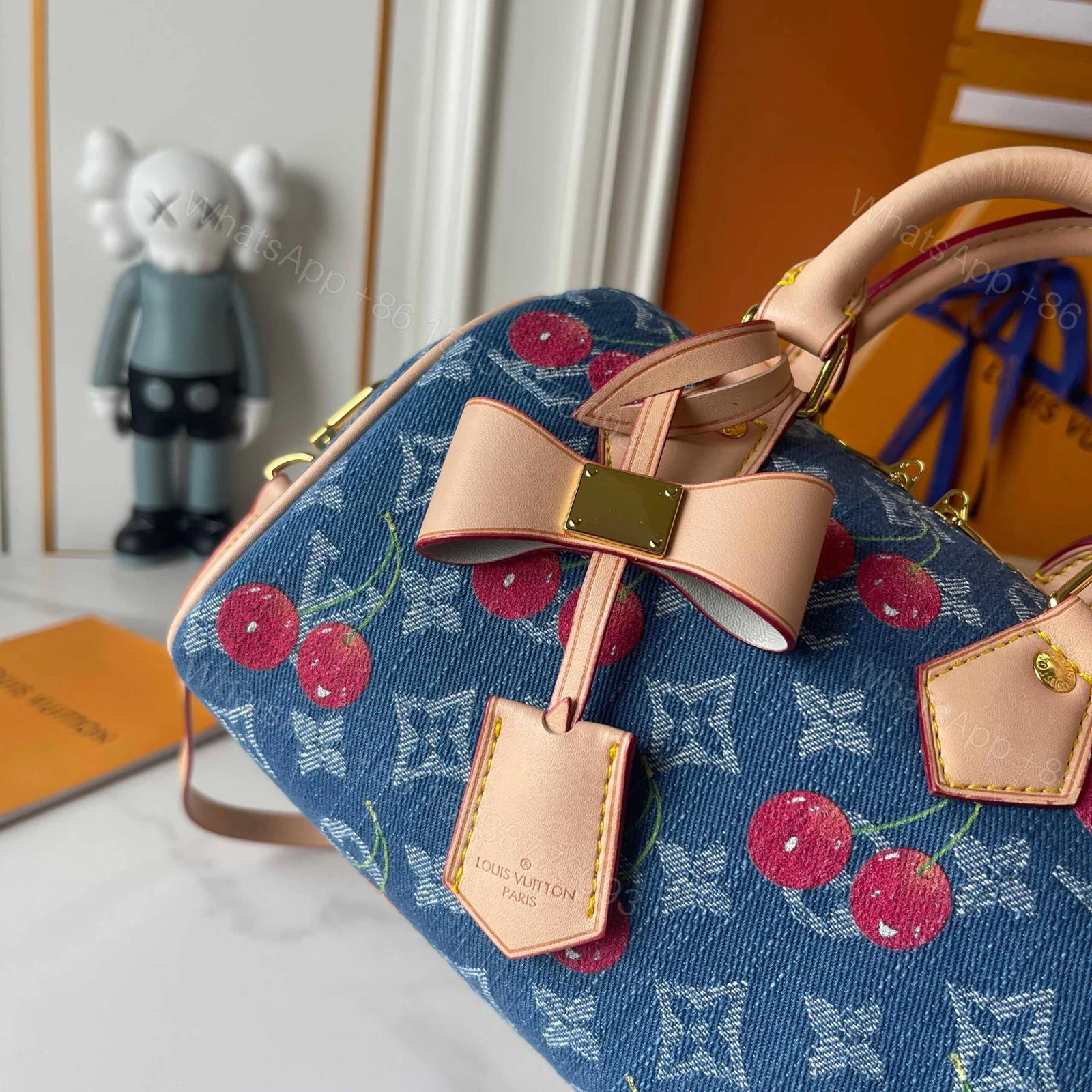 View 5 of LOUIS VUITTON X TAKASHI MURAKAMI SPEEDY BANDOULIÈRE 20 MONOGRAM DENIM BLUE 20CM