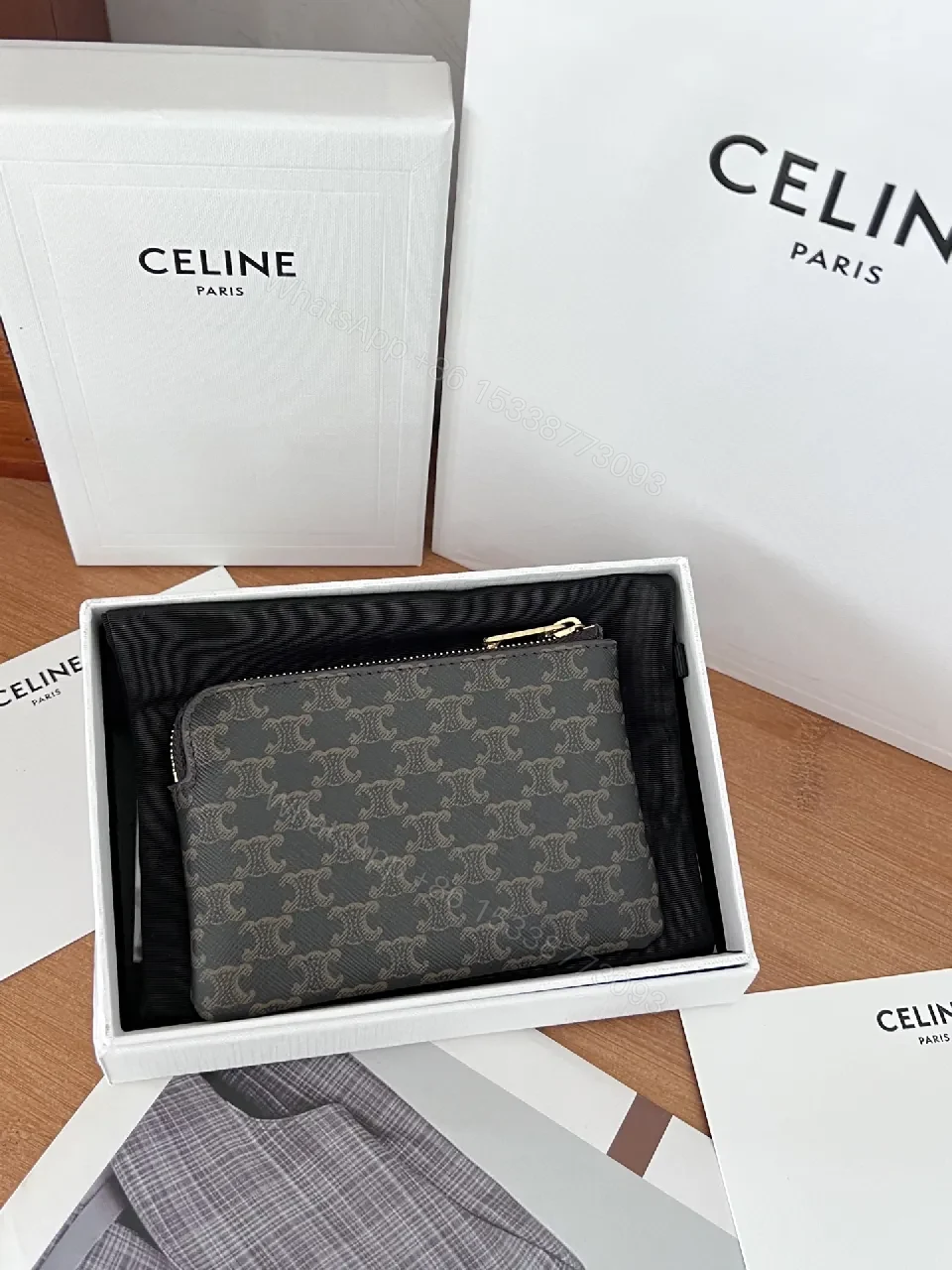 View 3 of Monogram Elegance Wallet: Subtle Pattern, Compact Luxury