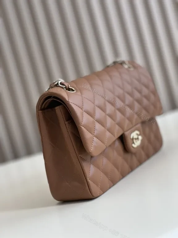 View 2 of Textured Quilted Saddle Bag with Signature Hardware - Brown Leather