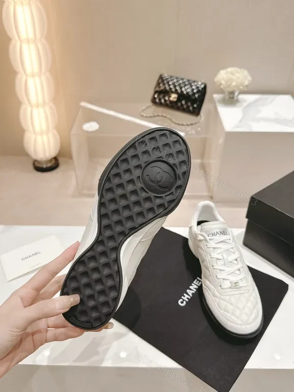 View 9 of White Quilted Platform Sneakers with Chanel Detailing