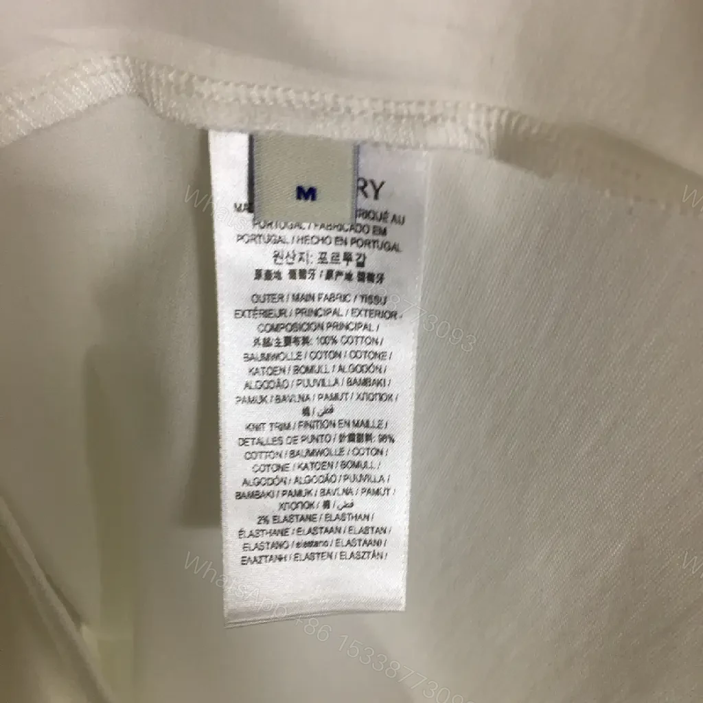 View 6 of Casual Luxe Tee: White Cotton with Plaid Shoulder Accents