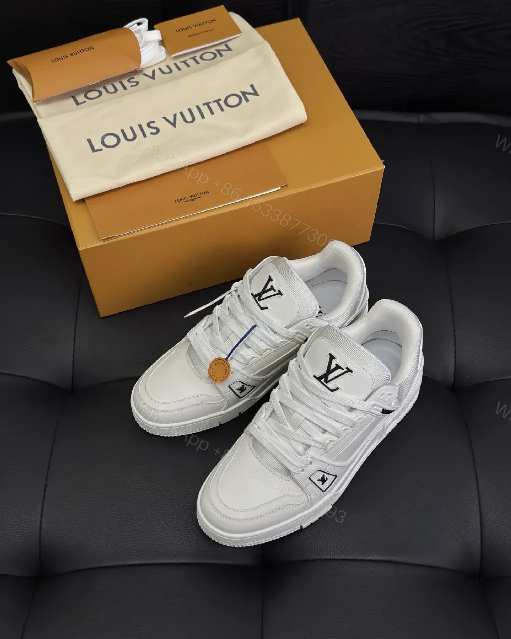 White Leather Sneaker - Minimalist Luxe with Signature Details — view 1