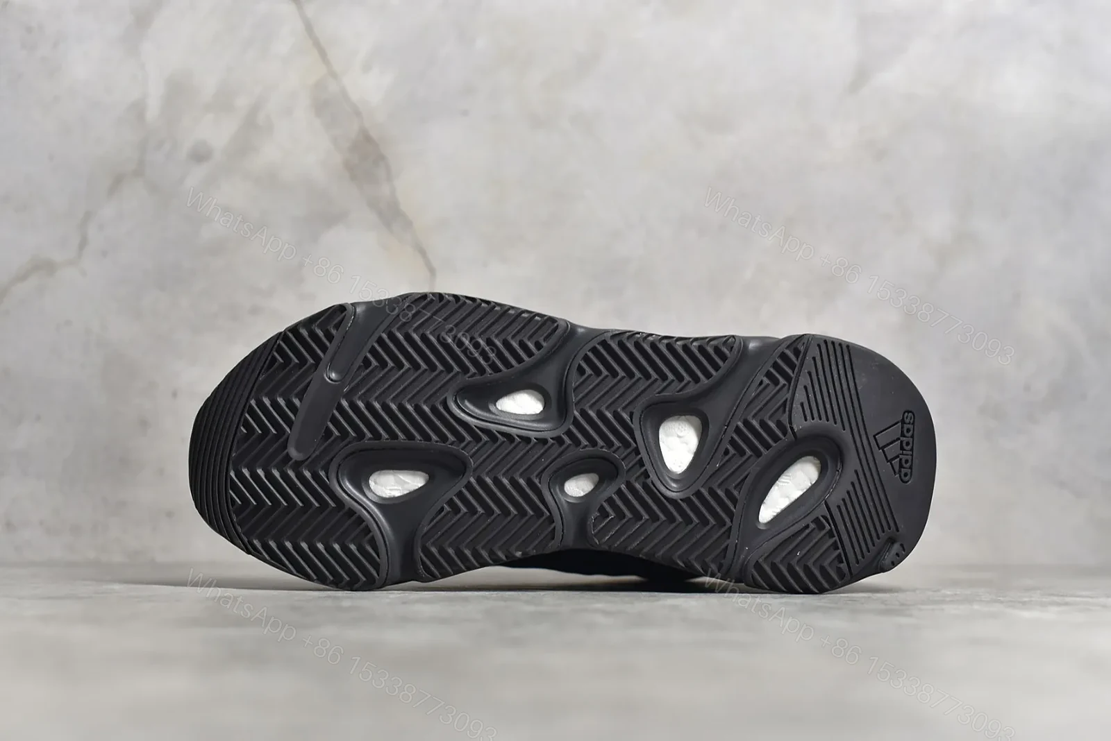 View 8 of Adidas Yeezy Boost 700 MNVN “Triple Black” Reps