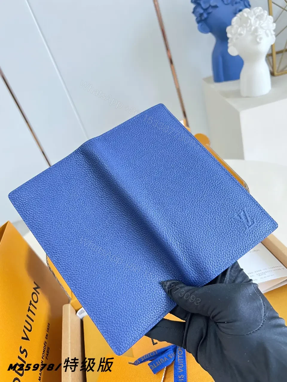 View 5 of Blue Pebbled Leather Wallet, Rectangular, Folded, LV-Embossed Style