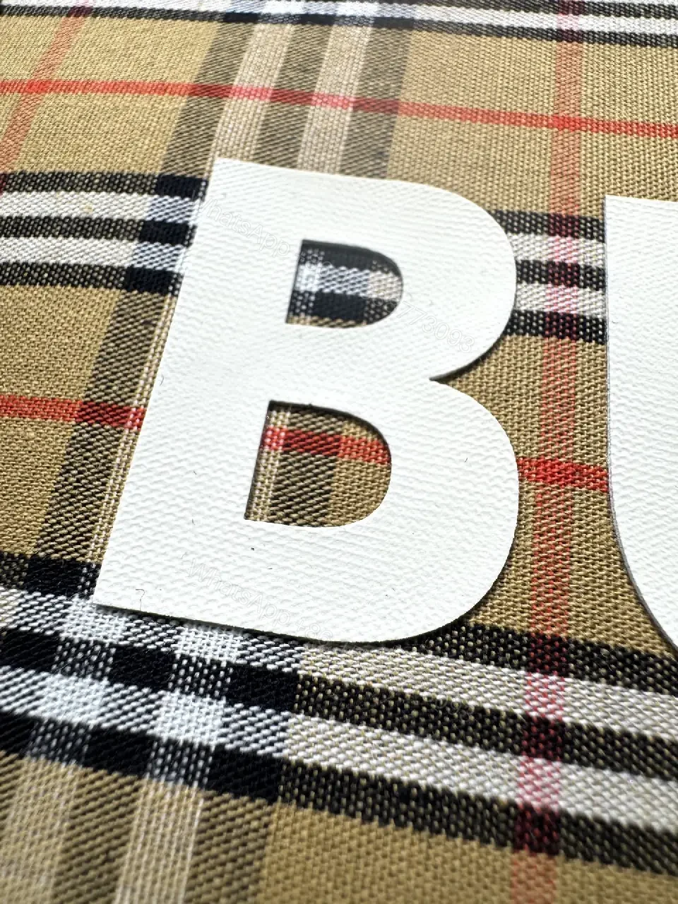 View 6 of Black Cotton-Blend Graphic Tee: Luxe Burberry-Style Banner
