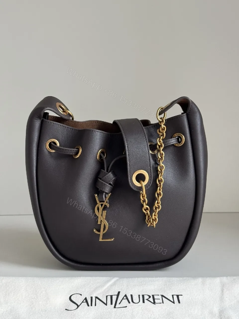 Deep Black + Leather + Minimalist + Gold Hardware + Bucket Bag — view 1