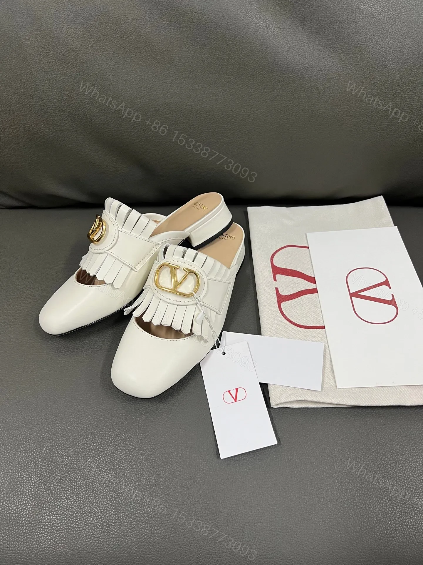 View 2 of Valentino Women White Leather Fringe Mules