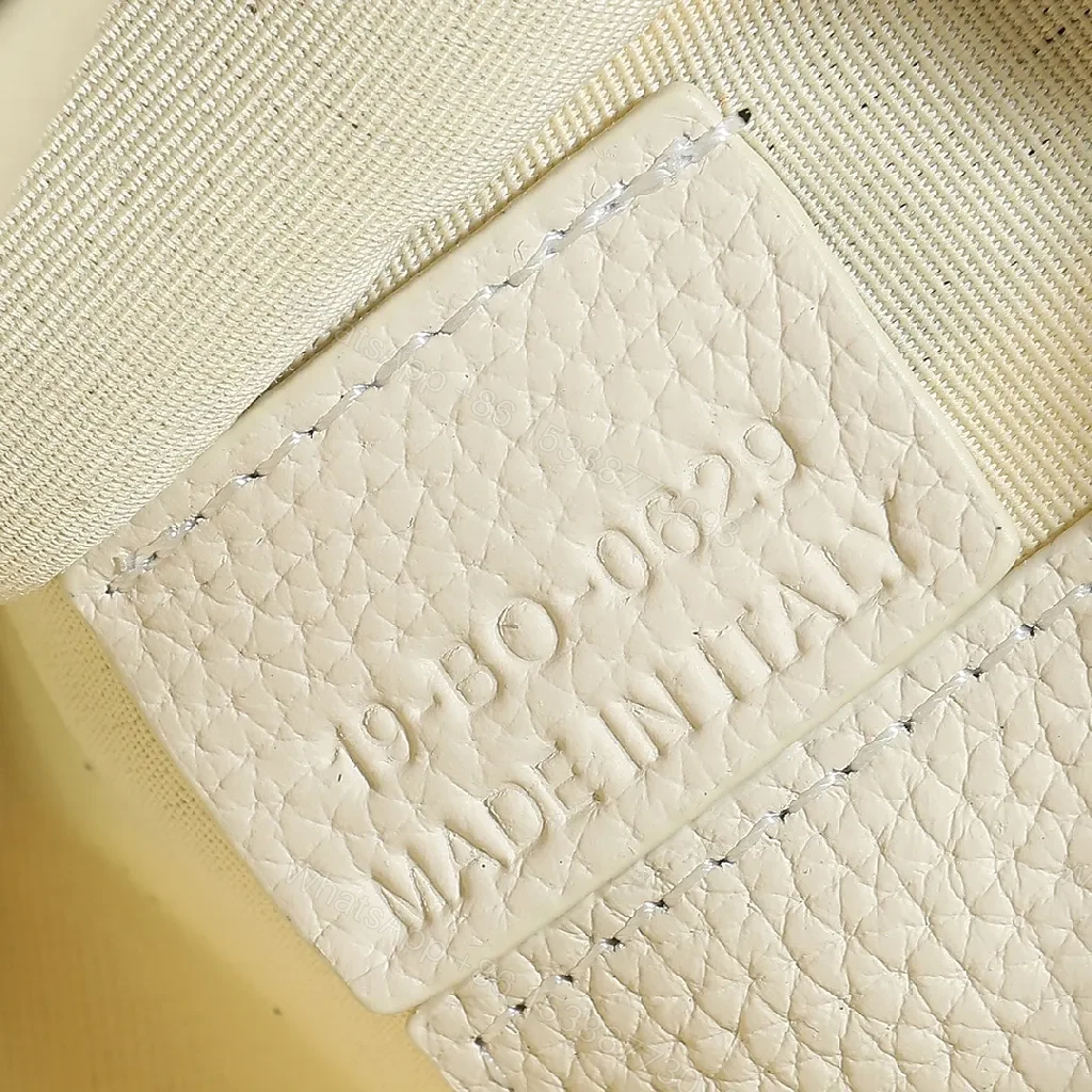 View 3 of Refined Monogram Clutch: Textured Grain, Silver Hardware, Lightweight Crossbody
